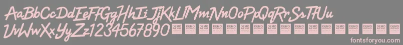 フォントHighVoltageDemo – 灰色の背景にピンクのフォント