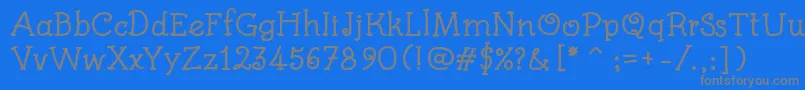 Fonte KidsBookBold – fontes cinzas em um fundo azul