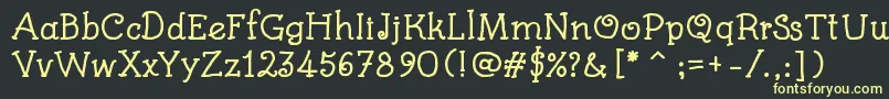 フォントKidsBookBold – 黒い背景に黄色の文字