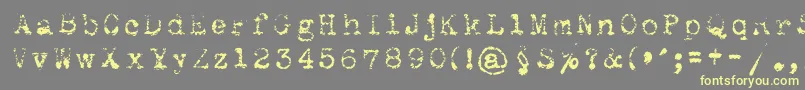 Maszynaroyallight Font – Yellow Fonts on Gray Background