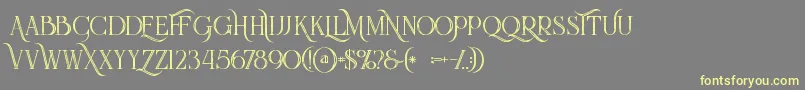 Queeninlinegrunge Font – Yellow Fonts on Gray Background