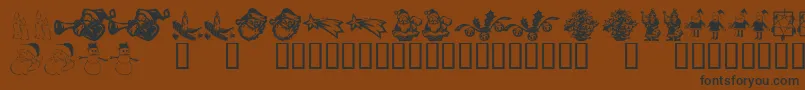 KrChristmasDings2004Six Font – Black Fonts on Brown Background