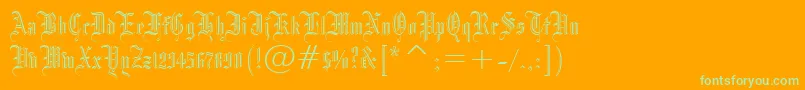 Blackletter686Bt-Schriftart – Grüne Schriften auf orangefarbenem Hintergrund