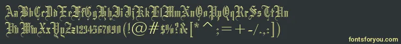 Blackletter686Bt-Schriftart – Gelbe Schriften auf schwarzem Hintergrund