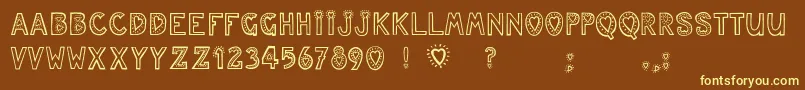 Juleslove Font – Yellow Fonts on Brown Background