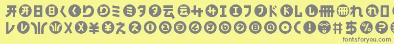 HamangairregularllNormal-fontti – harmaat kirjasimet keltaisella taustalla