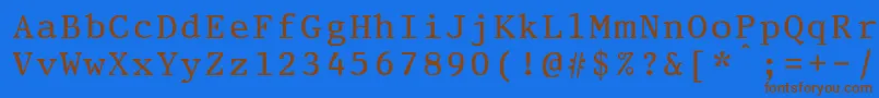 フォントPrestigeeliteboldBold – 茶色の文字が青い背景にあります。