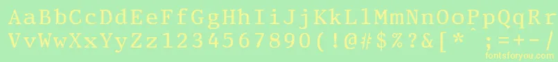 PrestigeeliteboldBold-fontti – keltaiset fontit vihreällä taustalla
