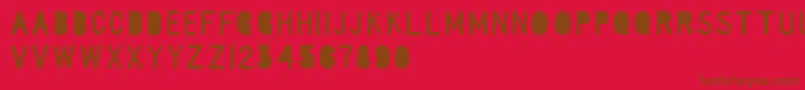 RulerElementary-fontti – ruskeat fontit punaisella taustalla