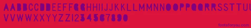 RulerElementary Font – Purple Fonts on Red Background