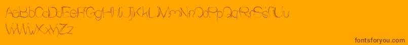Sensation-fontti – ruskeat fontit oranssilla taustalla