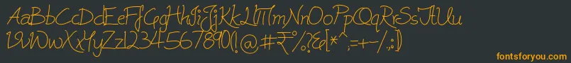 Cleavin Font – Orange Fonts on Black Background