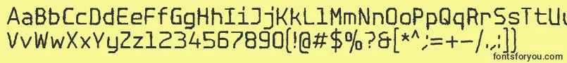 Шрифт SpotlightTypewriterNc – чёрные шрифты на жёлтом фоне