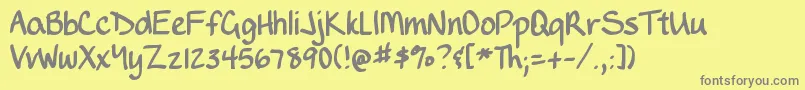 DjbWritesALot-fontti – harmaat kirjasimet keltaisella taustalla
