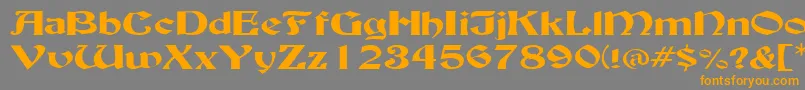 フォントBuckinghamwideRegular – オレンジの文字は灰色の背景にあります。