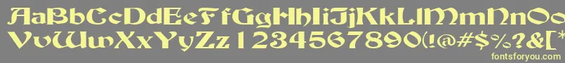 BuckinghamwideRegular-Schriftart – Gelbe Schriften auf grauem Hintergrund
