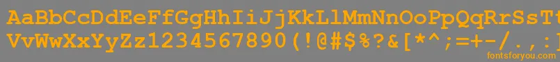 フォントCourtiercBold – オレンジの文字は灰色の背景にあります。