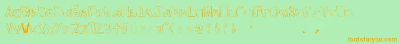 フォントTeenageDream – オレンジの文字が緑の背景にあります。