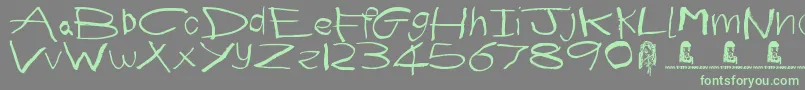 First Grader Font – Green Fonts on Gray Background