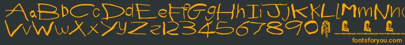 First Grader Font – Orange Fonts on Black Background