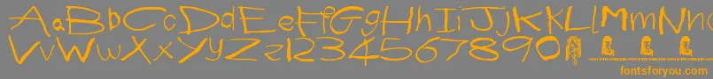 First Grader-Schriftart – Orangefarbene Schriften auf grauem Hintergrund