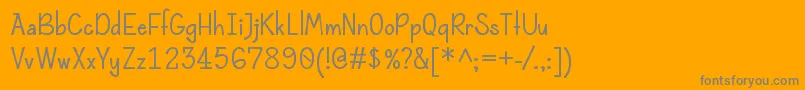 Lisätietoja Rolandebold-fontista Rolandebold-fontti – harmaat kirjasimet oranssilla taustalla