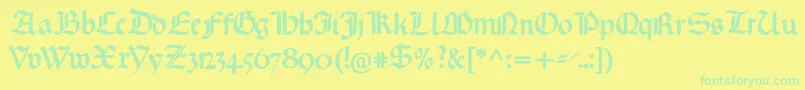 フォントGotischemissalschrift – 黄色い背景に緑の文字