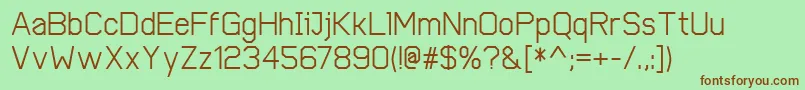 CobolMedium-fontti – ruskeat fontit vihreällä taustalla