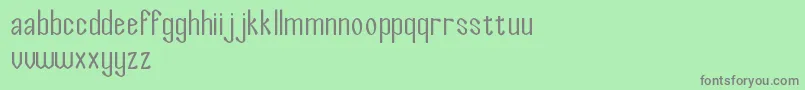 SaltOfTheEarth Font – Gray Fonts on Green Background