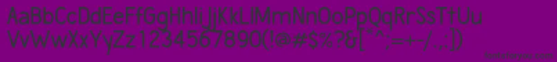 フォントWumbology – 紫の背景に黒い文字