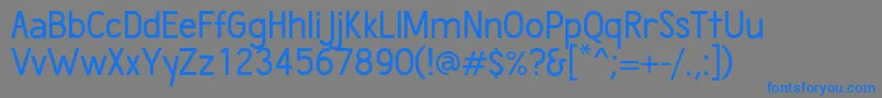 フォントWumbology – 灰色の背景に青い文字