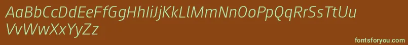 Augustsans46lightitalic-fontti – vihreät fontit ruskealla taustalla