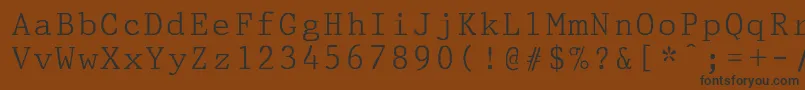PrestigepicaNormal Font – Black Fonts on Brown Background