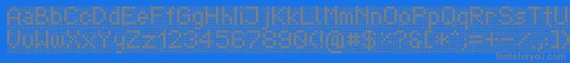 TpfDisplay-fontti – harmaat kirjasimet sinisellä taustalla