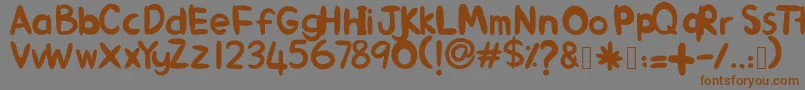 AlinKid Font – Brown Fonts on Gray Background