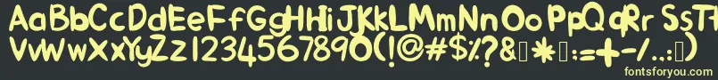 AlinKid Font – Yellow Fonts on Black Background
