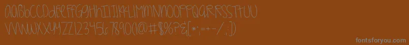 More about Kggirlonfire Font Kggirlonfire Font – Gray Fonts on Brown Background