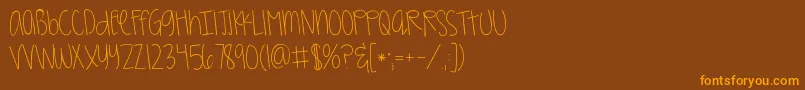 Kggirlonfire-Schriftart – Orangefarbene Schriften auf braunem Hintergrund