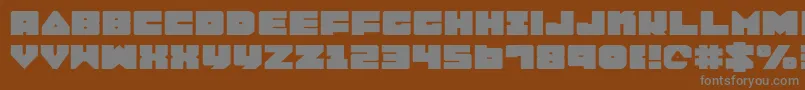 Lobotommye-fontti – harmaat kirjasimet ruskealla taustalla
