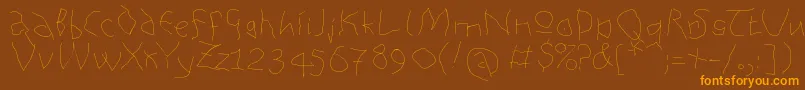 Czcionka Analphabetism – pomarańczowe czcionki na brązowym tle