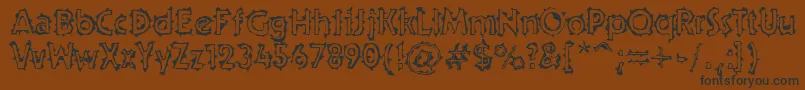 Teenick Font – Black Fonts on Brown Background