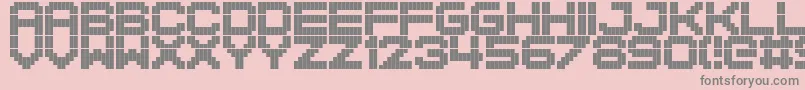 More about BlockStock Font BlockStock Font – Gray Fonts on Pink Background