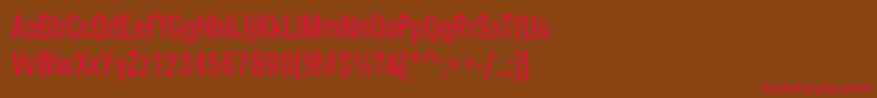フォントAnconaNarrowRegular – 赤い文字が茶色の背景にあります。