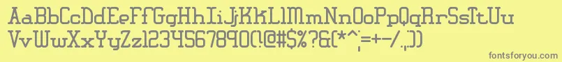 フォントAmplitud – 黄色の背景に灰色の文字