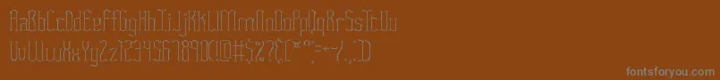 Fasciitw-Schriftart – Graue Schriften auf braunem Hintergrund