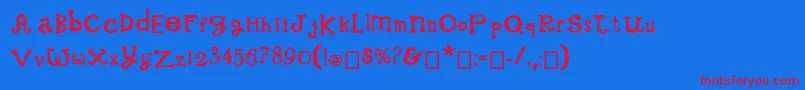 WhimsicalWilma Font – Red Fonts on Blue Background