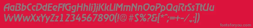 RagtimeMediumita-fontti – harmaat kirjasimet punaisella taustalla