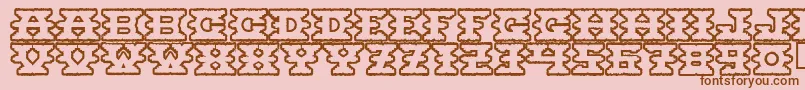 Шрифт Montezumaancient – коричневые шрифты на розовом фоне