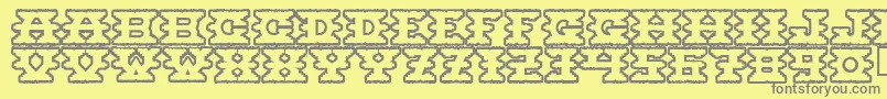 Montezumaancient Font – Gray Fonts on Yellow Background