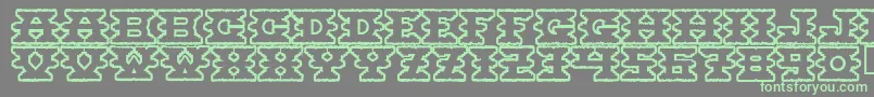 Montezumaancient Font – Green Fonts on Gray Background